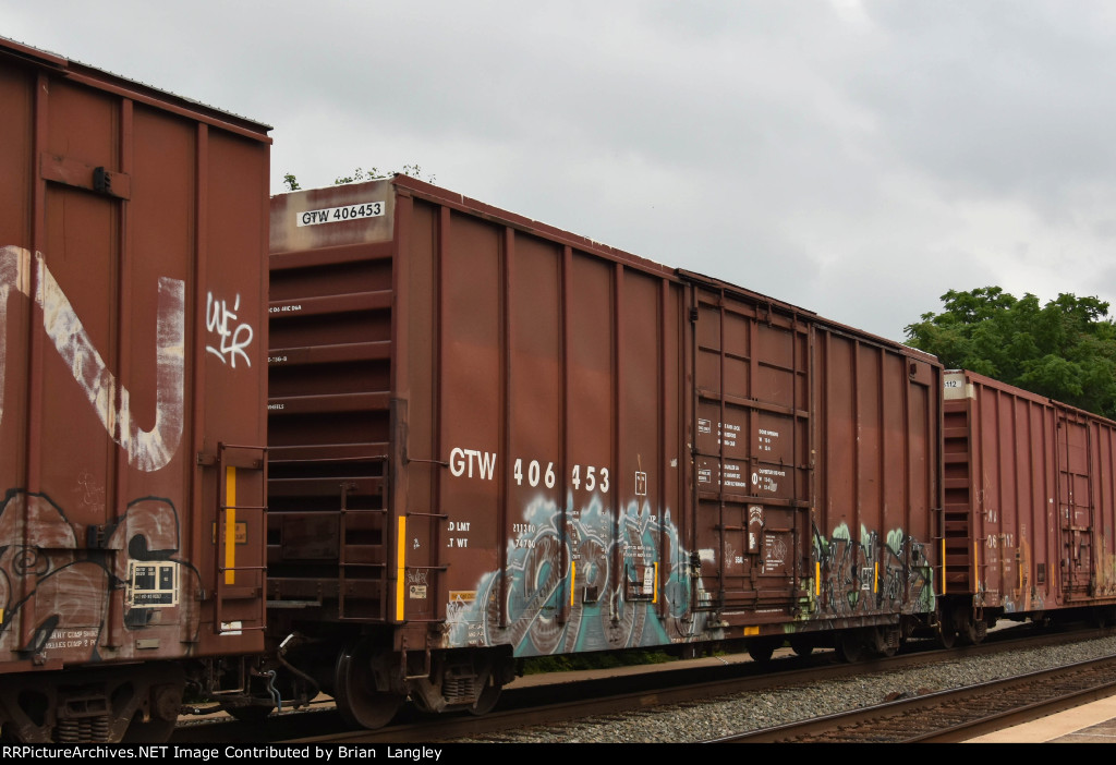 406453